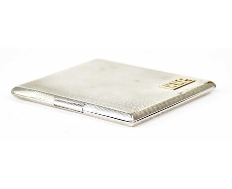 FREDERICK FIELD LTD; a George V hallmarked silver cigarette case, with gilt interior and engine turned decoration, applied in