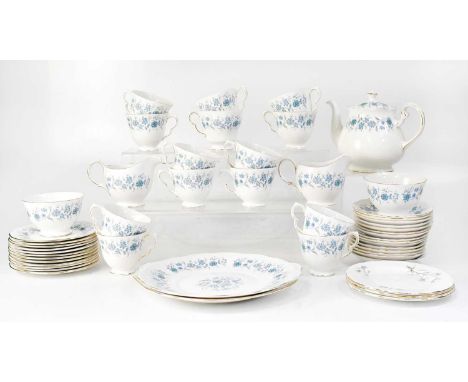 COLCLOUGH; a part tea service, white with blue periwinkles and flowers, comprising fourteen teacups, fifteen saucers and twel