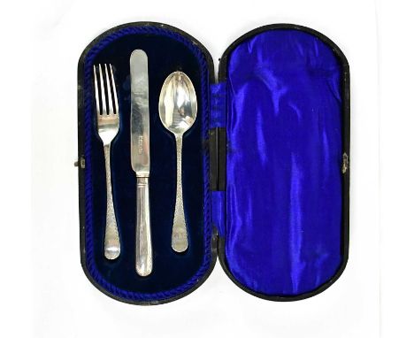 HARRISON BROTHERS &amp; HOWSON; a cased George V hallmarked silver knife, fork and spoon set, the handles engraved with the i