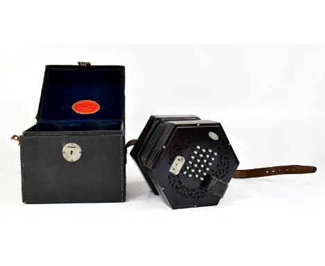 C. WHEATSTONE; a late 19th/early 20th century concertina, serial no. 30734, with forty-eight buttons, ebonised body and five 