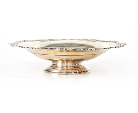 ADIE BROTHERS LTD; a George VI hallmarked silver footed bowl with shell and scroll decorated edge, Birmingham 1945, 5.5 x 23.