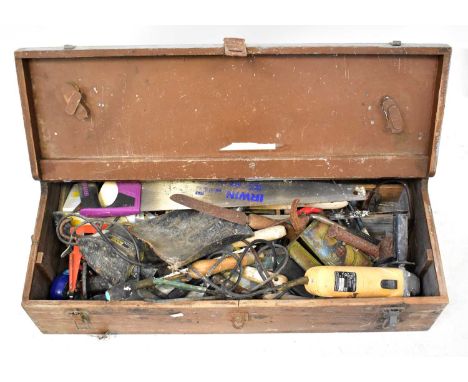 A large wooden toolbox containing a quantity of tools.