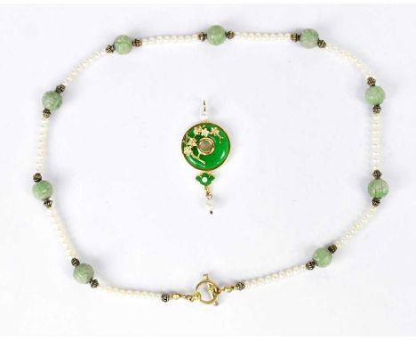 A Franklin Mint 'Jade Princess' pendant in gold-plated 925 silver, set with a green jade disc, five small diamonds and two pe
