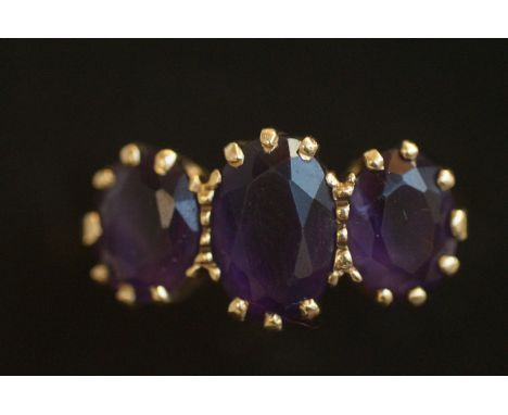 9ct Gold ring set with 3 amethyst stones