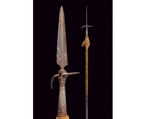 dating: 17th Century provenance: Europe, Spearhead with a double-edged blade (pitting) with a central rib extending  extends 