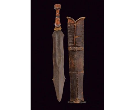 dating: Late 19th Century provenance: Congo, Wide, straight, double-edged blade with four small wings and central groove, dec