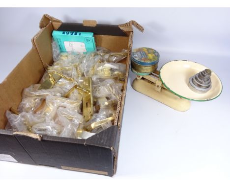 Collection of brass door handles and fittings, as new and a set of Vintage kitchen scales and weights in one box   Condition 