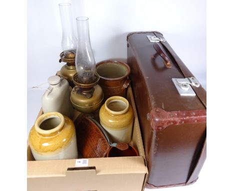 Two brass oil lamps, vintage crocodile skin bag, stoneware hot water bottle, other stoneware jars and a vintage suitcase   Co
