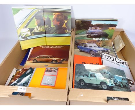 Collection of Vintage car brochures including Mercedes Benz, Land Rover, MG etc in two boxes   Condition Report   Click here 