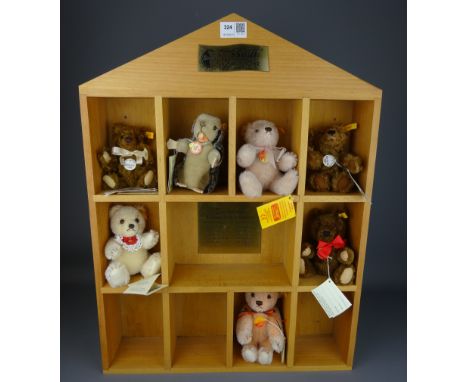 Steiff display shelf, H60cm and seven small Steiff bears   Condition Report   Click here for further images, condition, aucti
