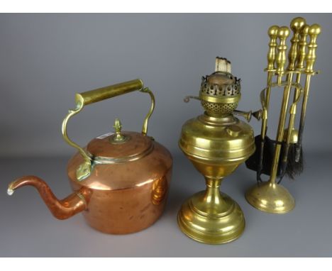Victorian copper kettle, brass fire irons and a brass oil lamp base (3)   Condition Report   Click here for further images, c