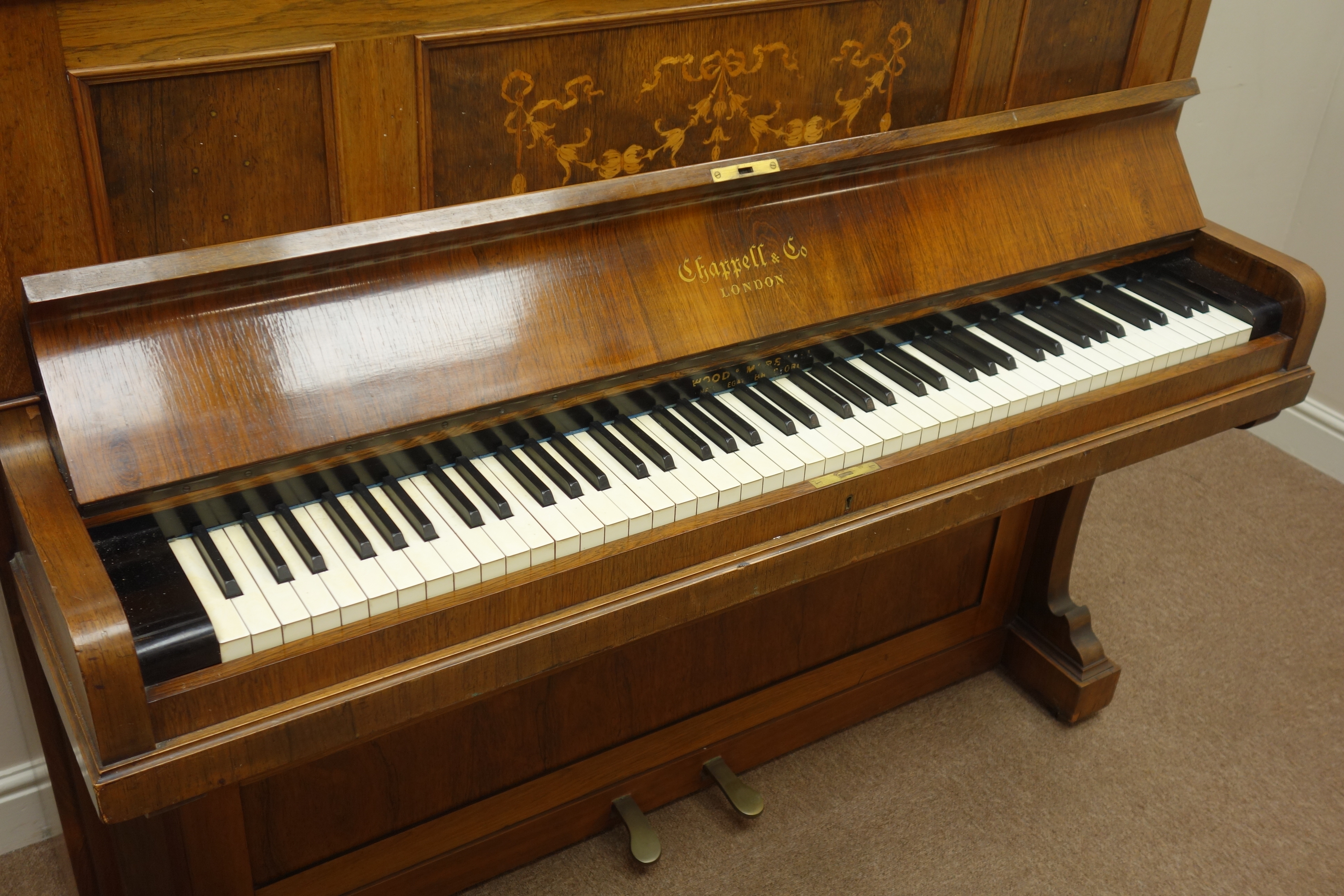 Victorian inlaid rosewood cased upright piano by 'Chappell, London', iron framed and overstrung,