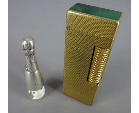 Novelty EPNS propelling pencil in the form of a Champagne bottle with enamel label and a Dunhill gold plated pocket lighter w