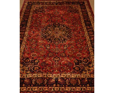 Persian Kashan plum ground rug carpet, large central rosette medallion, stylised floral field repeated in border, 290cm x 196