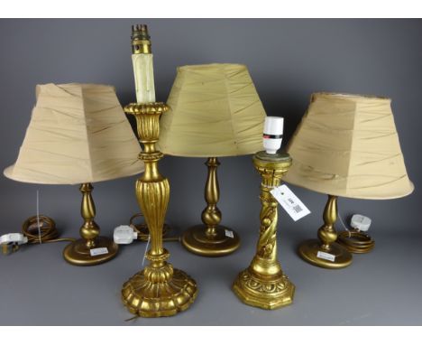 Two gilt ornate table lamps, pair of brass effect table lamps, another matching table lamp four similar shades (9) (This item