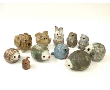 A collection of Briglin Pottery animal money boxes including Hedgehogs, Moles, Rabbit and bird plus two other pottery Elephan