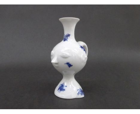 A Rosenthal porcelain candle holder. Studio Linie, 'Form Romanze'.  White gloss glaze with blue painted flowers.  14.3cm high