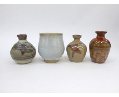 Two Lowerdown Pottery bud vases painted with the Foxglove pattern, a Lowerdown Yunomi with china glaze, all with pottery seal