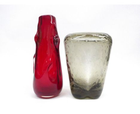 A Whitefriars Ruby Knobbly vase, 24.5cm high, together with a Whitefriars vase with controlled bubble detail, 19cm high (2)