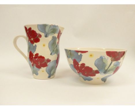 A Janice Tchalenko pottery large Poppy design pitcher and a bowl, tallest 20.5cm (2)