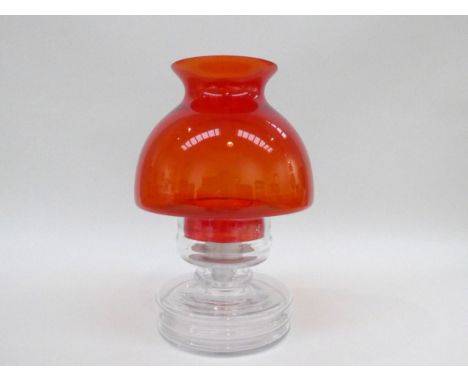 A Finnish 'Apollo' lamp by Nanny still in red and clear glass. 26cm high