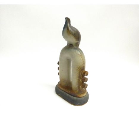 JORGE MEALHA (1934-2021) A studio ceramic figure of a bird on a pipe. Impressed seal. 31cm high