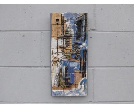 A Brutalist wall hanging tile panel by Cuby Ceramics of Cornwall. Label verso.  Overall size  50cm x  23cm