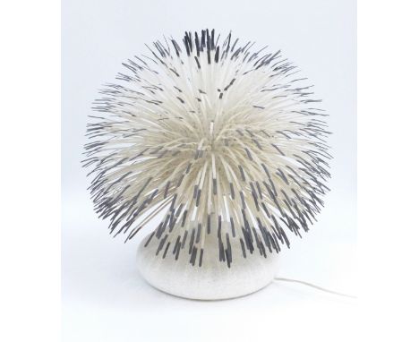 A Habitat lamp with cable ties, designed by Claire Norcross, 52cm high