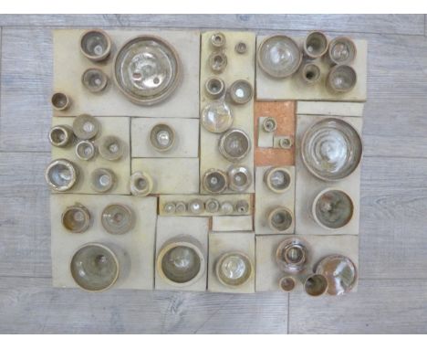 A mid 1970's ceramic wall art plaque with relief cup and saucer forms. Unmarked. 46.5cm x 39cm