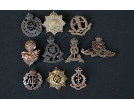 A Collection Of British Military OSD (Officer Service Dress) Insignia To Include Army Service Corps Cap Badge, Royal Artiller