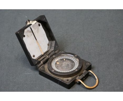 A British Military Issued Mark 1 Magnetic Marching Compass By T.G.Co. Ltd, Marked With The British Broad Arrow. 
