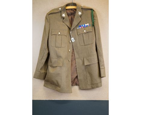 A British Army No.2 Dress Tunic, Complete With Buttons, Badges And Medal Bar. 