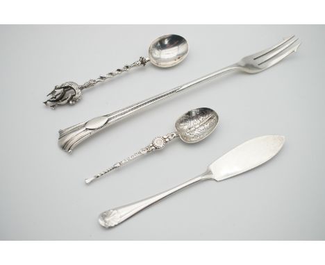Silver flatware including a Victorian pickle fork, a butter knife, an anointing spoon and a white-metal teaspoon with the ter