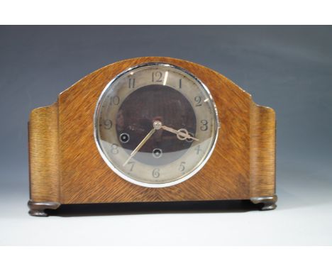 A H.A.C. oak mantle clock
