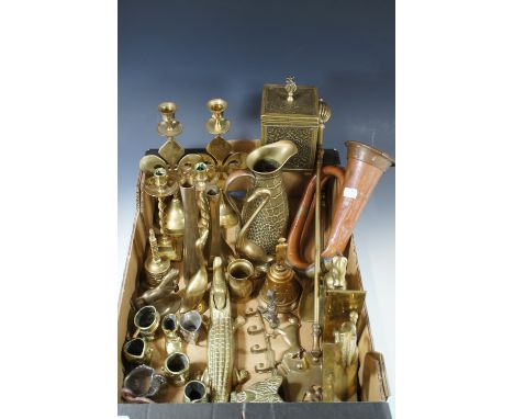 A large quantity of copper and brass including a bugle, tea caddy etc.