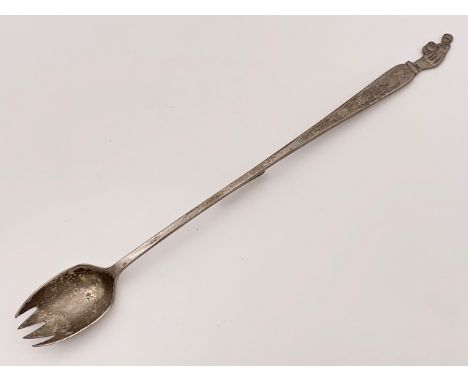 A vintage electroplate "Tom-Tom" man pickle fork