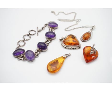Contemporary amethyst and amber jewellery mounted in white-metal, including an amethyst cabochon bracelet, and three amber pe