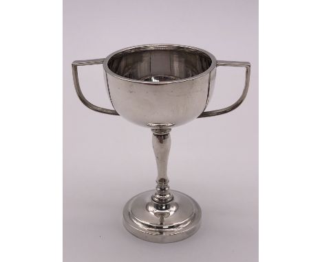 A small silver trophy cup, 8 cm 