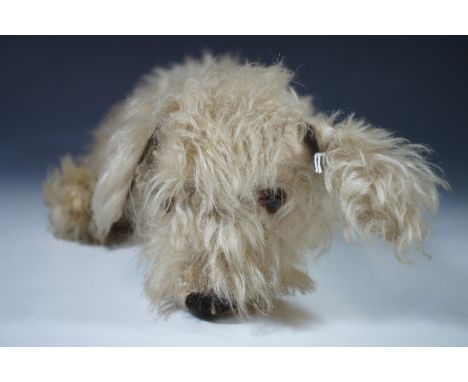 A vintage plush soft toy dog