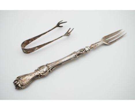 A pair of George VI silver sugar tongs and a Victorian silver pickle fork, 32.4g