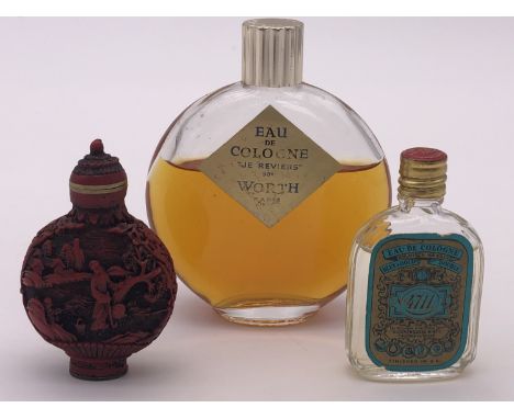 A vintage bottle of Worth of Paris "Je Reviens" perfume in a Lalique glass bottle, a small bottle of Maurer and Wirtz "No 471