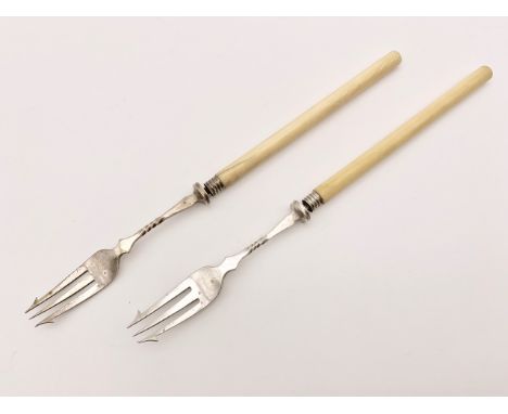 Two Victorian ivory-handled silver pickle forks by Mappin &amp; Webb