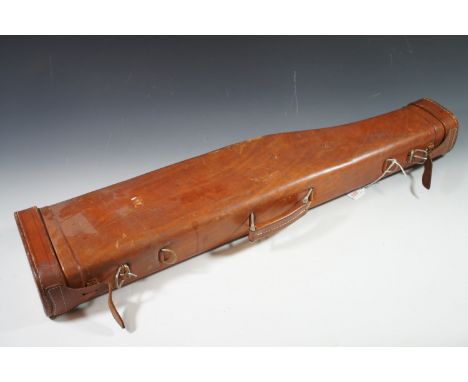 A vintage leather leg of mutton shotgun case