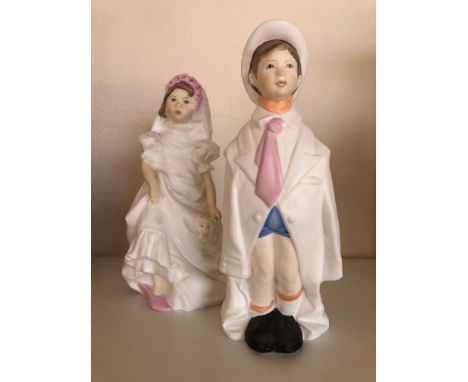 A pair of Royal Worcester "Wedding Day" figurines