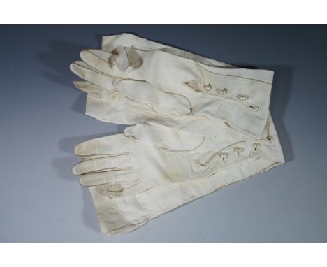 A pair of vintage ladies gloves.