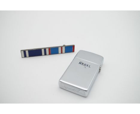 A Pratt and Whitney engines zippo lighter and medal ribbon bar