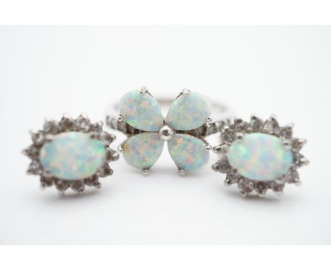 A contemporary Gilson opal, paste and white-metal dress ring and earring set, stamped '925', (tests as silver), together with