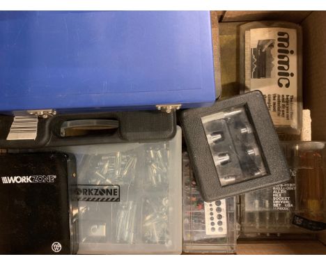 Assorted measuring tools and router cutters