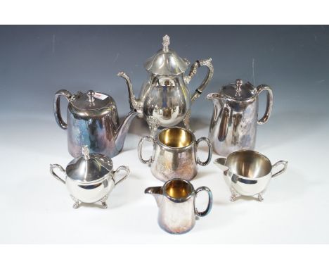 A four-piece electroplate tea set together with an electroplate three piece service