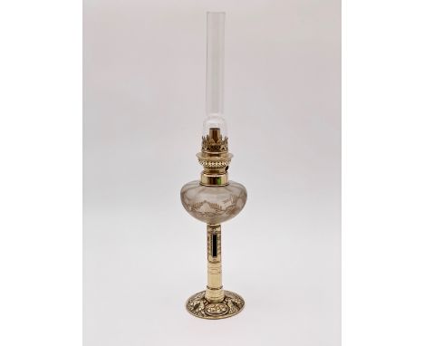 A Victorian glass spigot oil lamp and a brass stand, (latter converted form a "candlestick" postal balance scale)